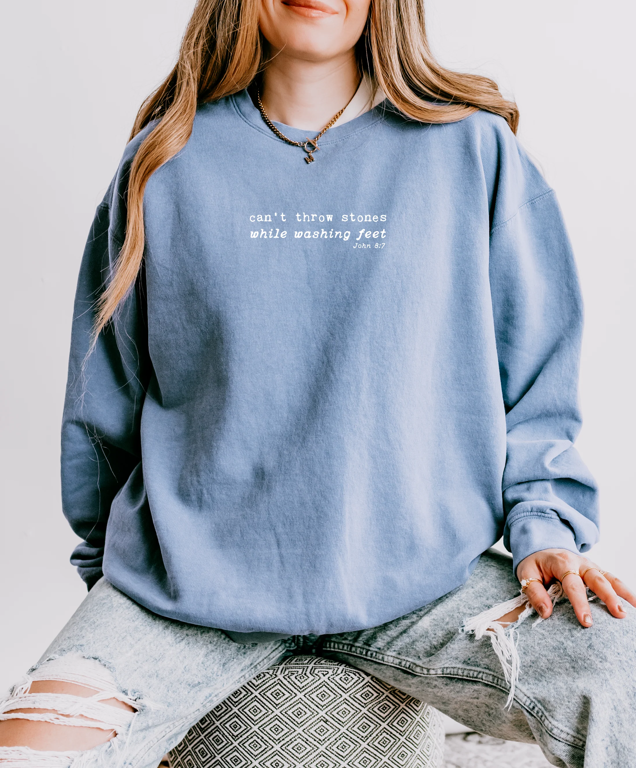 CAN'T THROW STONES WHILE WASHING FEET UNISEX SWEATSHIRT